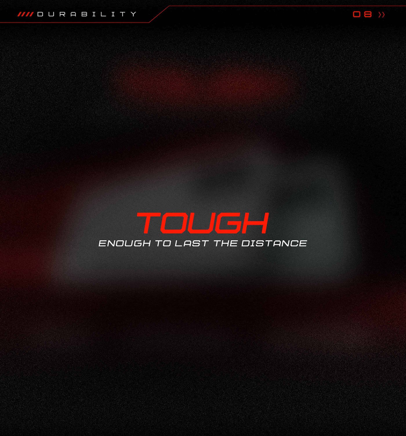 The image features a bold text stating "TOUGH" in red, with a subtext that reads "ENOUGH TO LAST THE DISTANCE" in a lighter font. The background has a dark gradient, creating a dramatic effect, emphasizing durability.