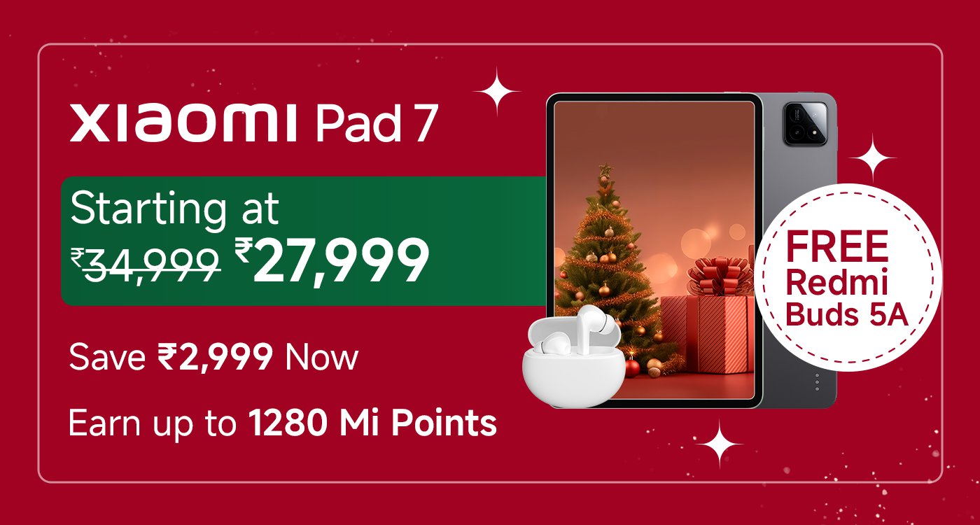 Xiaomi Pad 7 promotion featuring a festive background with a Christmas tree. The ad highlights a starting price of ₹27,999, down from ₹34,999, with a saving of ₹2,999. It also mentions earning up to 1280 Mi Points and includes a free gift of Redmi Buds 5A.