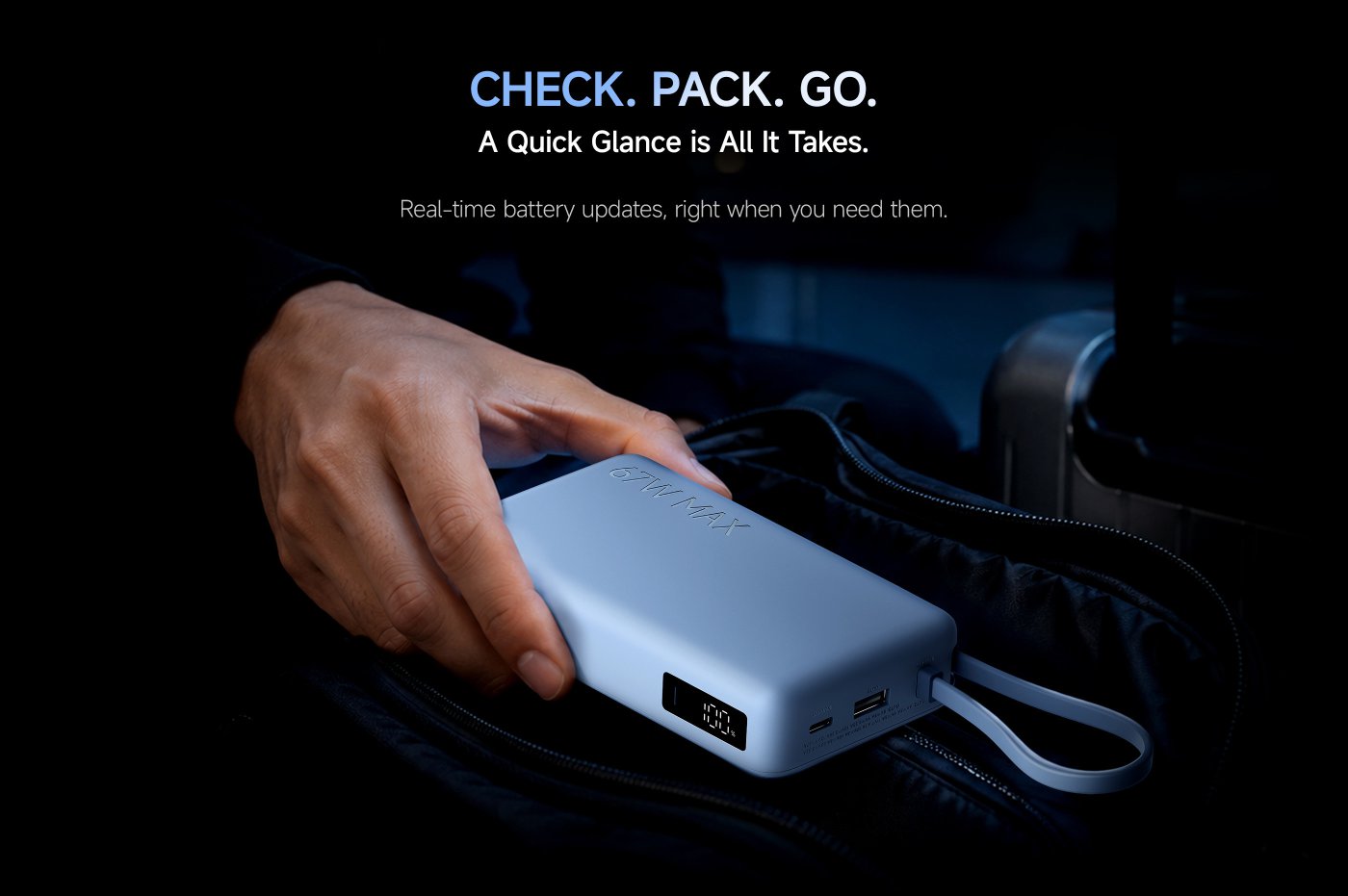 A blue power bank, marked with "67W" and "20000", with a black background. The text includes "NEVER MISS A MOMENT" and "67W Turbo Charging That Keeps Pace with Your Day".