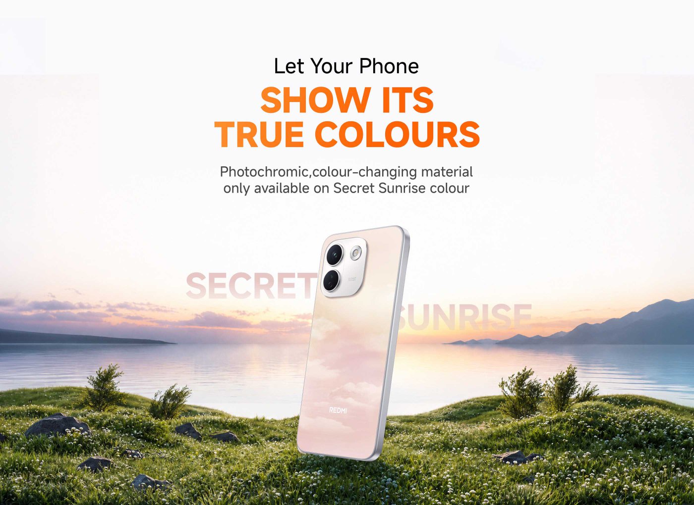 A smartphone is displayed against a scenic background featuring a lake and mountains at sunset. The phone has a color-changing feature described as "photochromic" and is shown in the "Secret Sunrise" color. The text promotes the phone's ability to showcase its true colors.